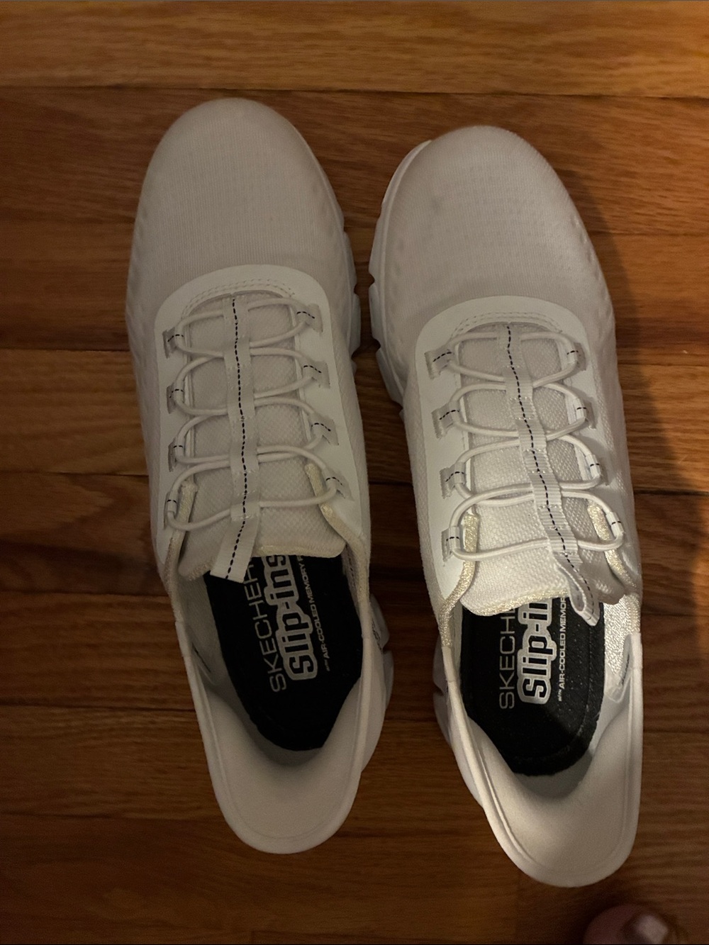 Skechers Women’s White Slip-On Knit Sneakers
